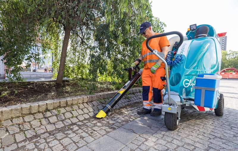 Glutton H2O — working on a cobblestone pedestrian path
